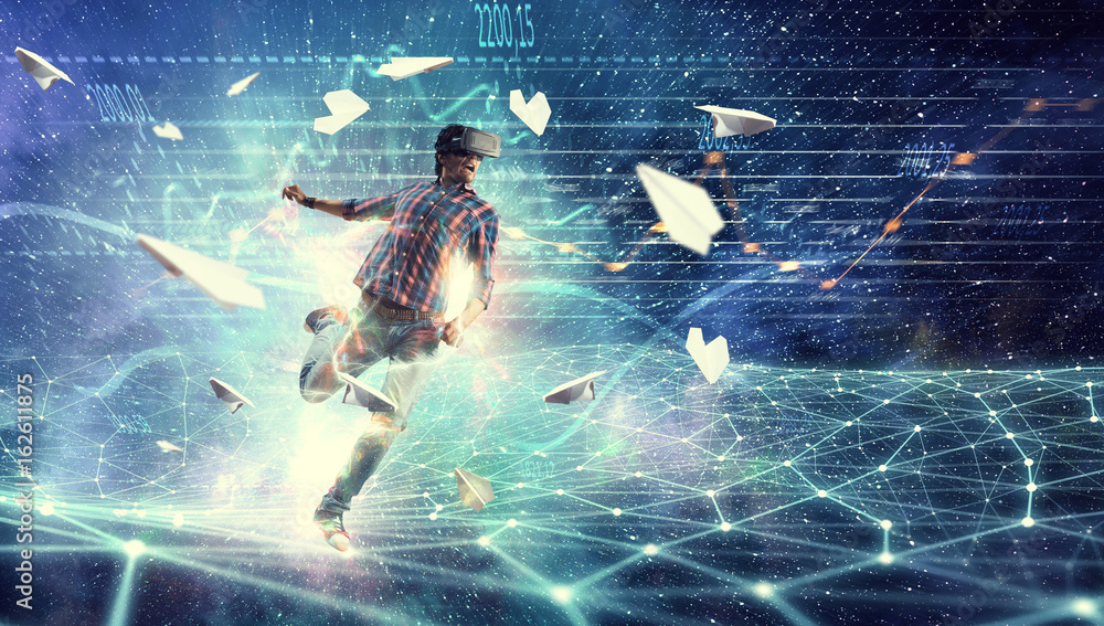 Man in virtual helmet . Mixed media