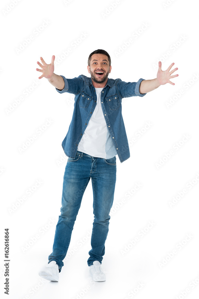 excited man with straighten hands while looking at camera isolated on white excited man with straighten hands while looking at camera isolated on white