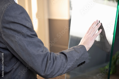 Businessman using touchscreen