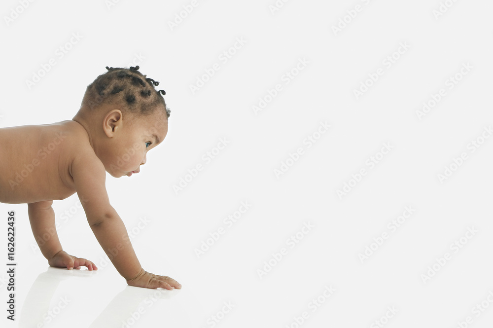 Fotografie Baby starting to crawl