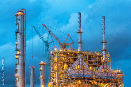 Refinery tower in petrochemical industrial plant with Twilight