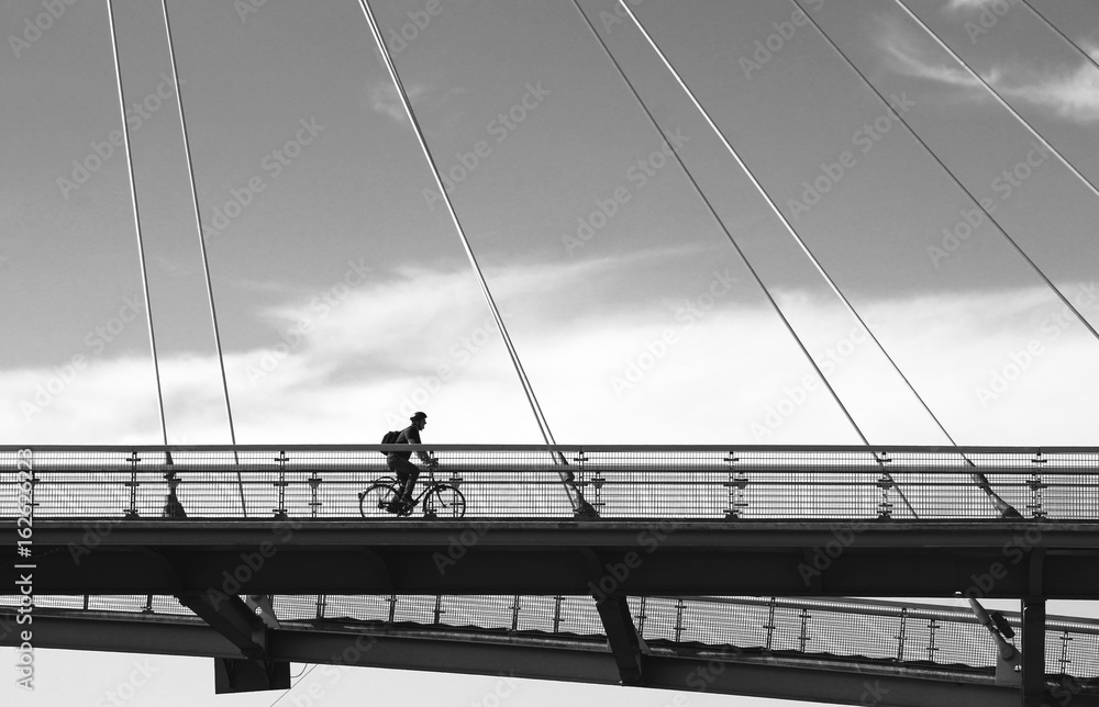 cyclist on a bridge