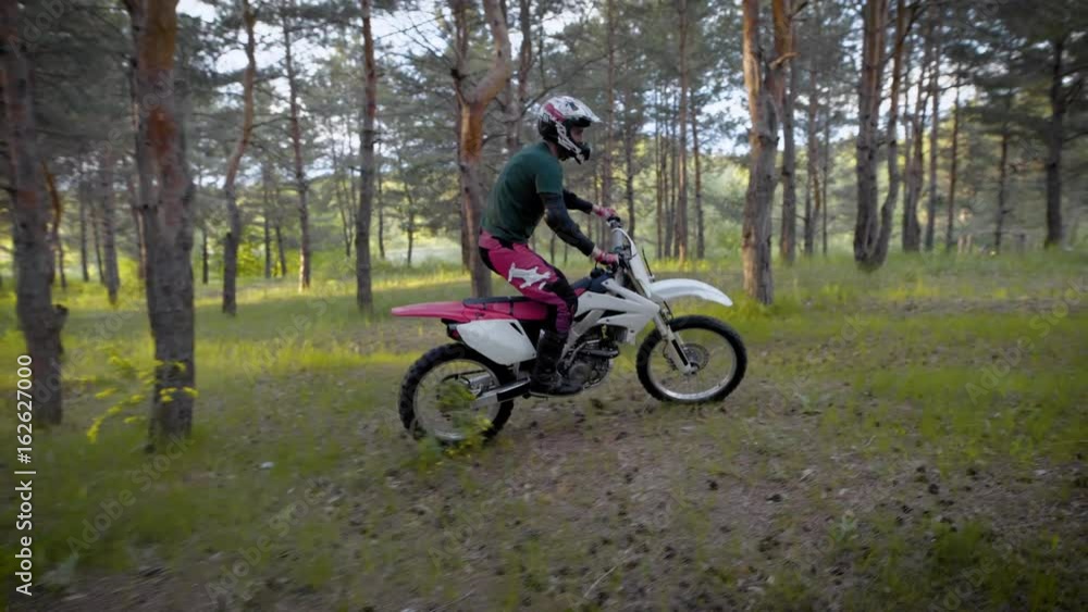 Motocross, enduro rider on forest. Extreme off-road race. Hard enduro motorbike. Motocross, enduro rider on forest. Extreme off-road race. Hard enduro motorbike.