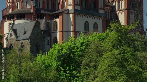 The Catholic Cathedral of Limburg is high location on a rock above the Lahn river, Limburg, Germany, Jun 2017, tracking shot photo