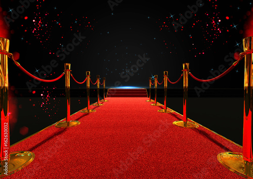 Fotografia long red carpet between rope barriers with stair at the end