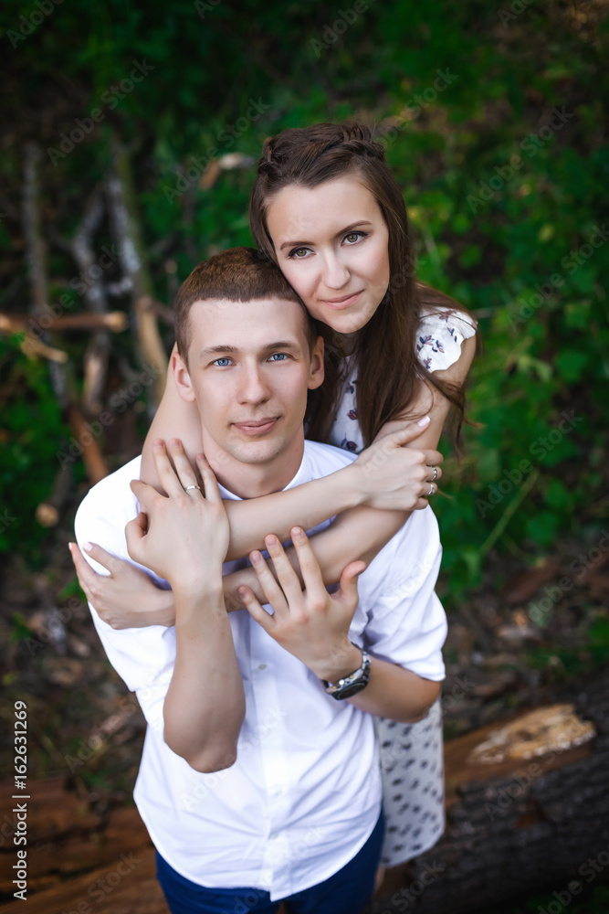 Fototapeta premium couple hugging in forest