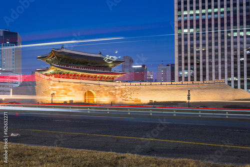 Namdaemun gate (Sungnyemun) cityscape at night, fortress of seoul, South Korea. photo