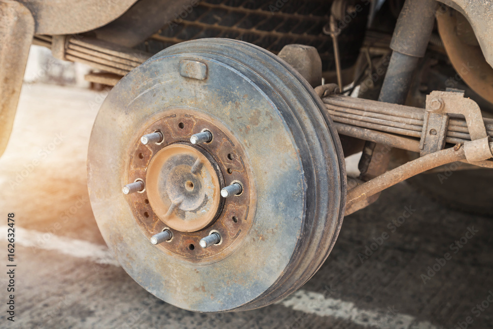 Rusty wheel hub car with drum brake system and suspension during change wheel tyre Rusty wheel hub car with drum brake system and suspension during change wheel tyre