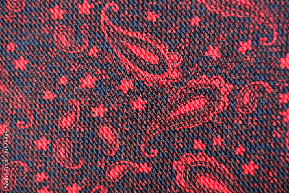 Red and black fabric with paisley pattern