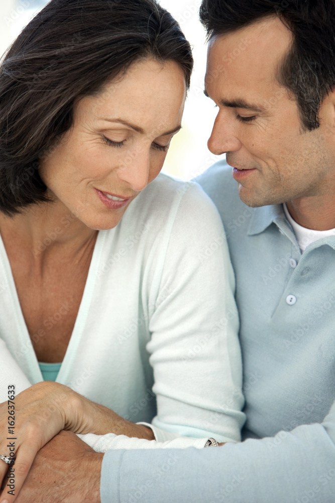 Love and tenderness between a middle aged couple