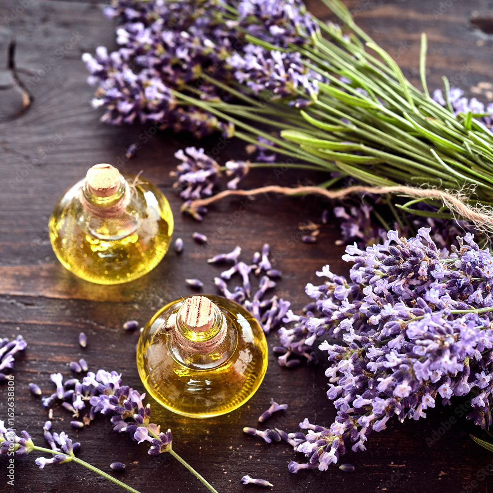 Freshly harvested lavender with essential oil - obrazy, fototapety, plakaty 