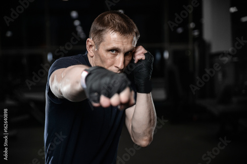 Martial arts fighters in gym © antondotsenko
