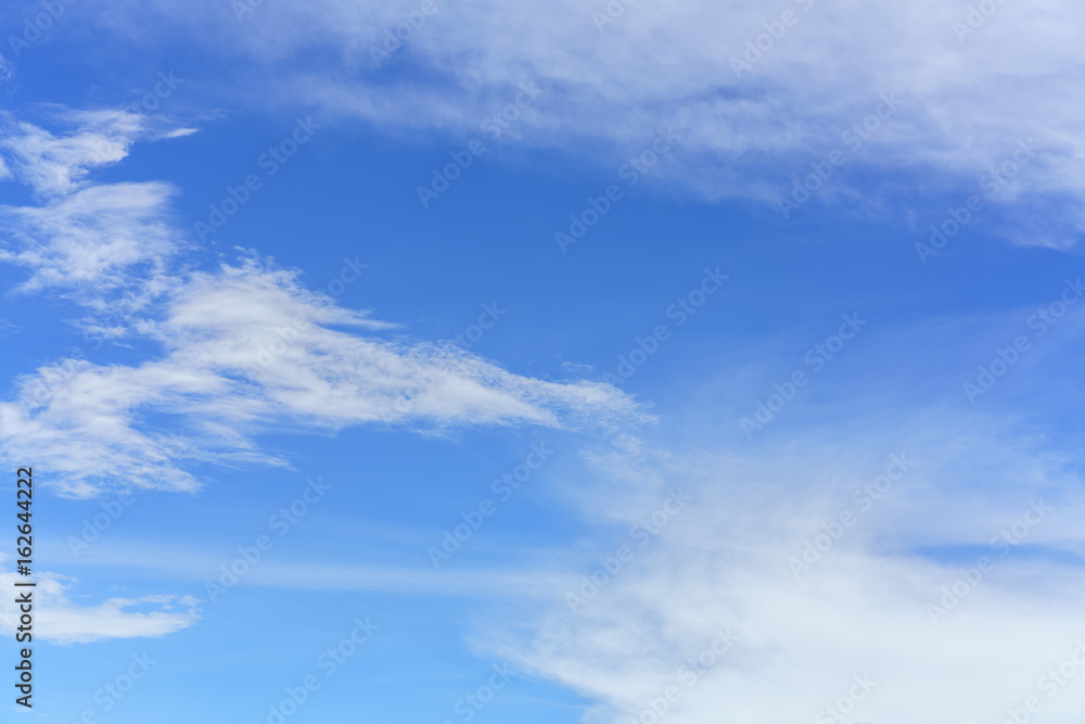 Beautiful white clouds and blue sky background