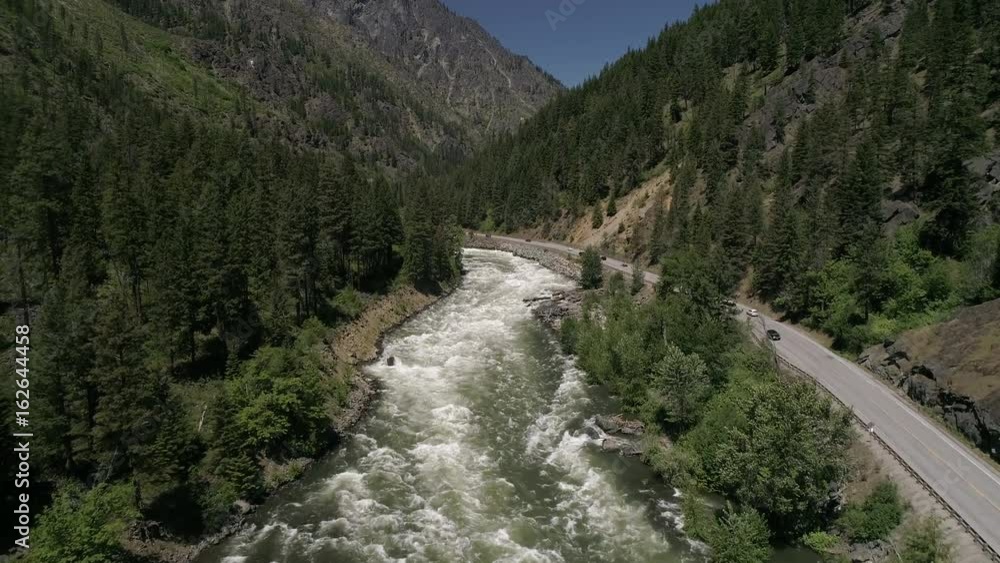 Aerial Flying Over Wenatchee River at Tumwater Canyon with Cars Traveling on Highway 2 in Washington Aerial Flying Over Wenatchee River at Tumwater Canyon with Cars Traveling on Highway 2 in Washington