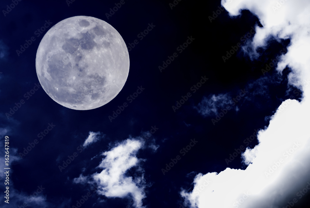 Nature background. Attractive photo of night sky with cloudy and super moon