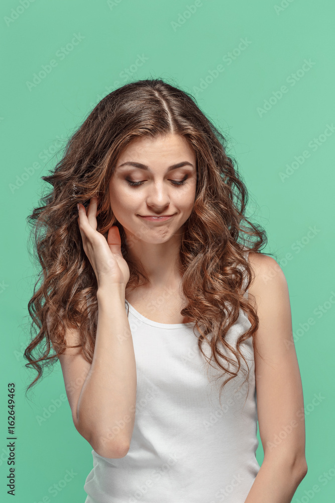 The young woman's portrait with thoughtful emotions The young woman's portrait with thoughtful emotions