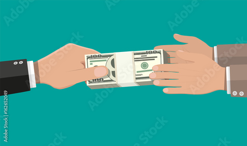 Two businessman hands, giving money.