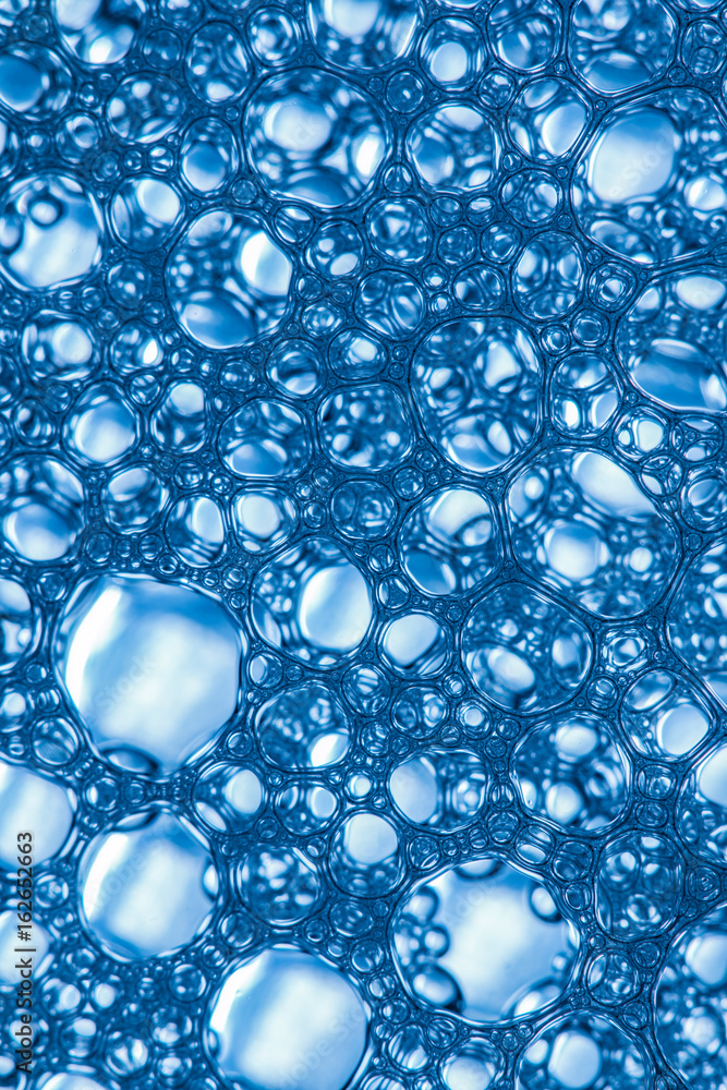 Selective focus blue soap bubbles