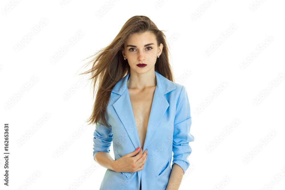 Pretty young business woman in blue jacket without bra under it Pretty young business woman in blue jacket without bra under it