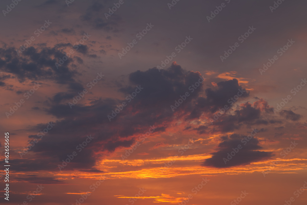 Beautiful summer sunset with clouds in the sky.