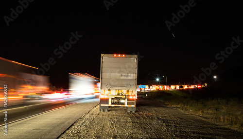 Truck and heavy Traffic Jam on Freeway at night