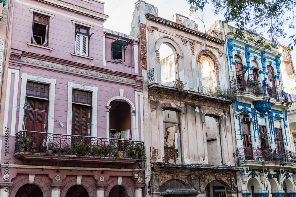 Dilapidated houses facing Paseo de Marti (Prado) avenue in Havana