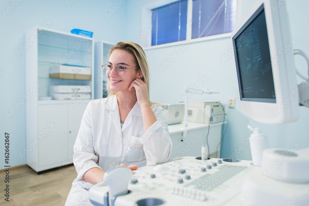 portrait of young female dentist in office portrait of young female dentist in office