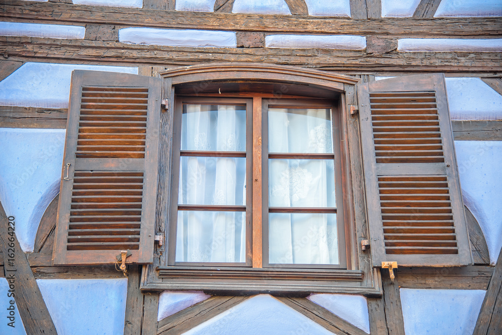 Deatil of a traditional alsatian window in Colmar, France Deatil of a traditional alsatian window in Colmar, France