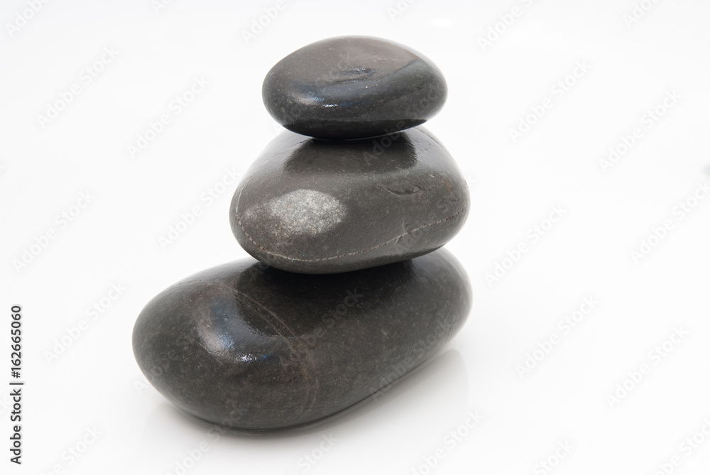 Spa treatment background of pebbles and running water Spa treatment background of pebbles and running water