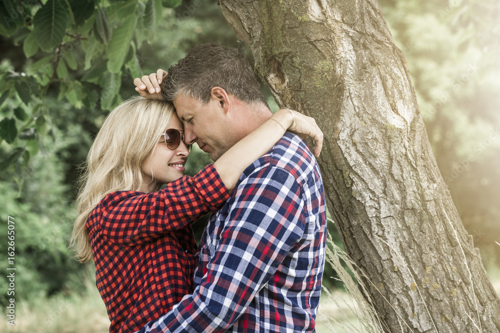 Fototapeta premium young laughing woman with his happy boyfriend