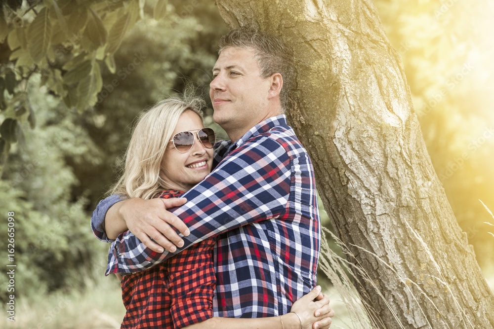 Fototapeta premium young laughing woman with his happy boyfriend
