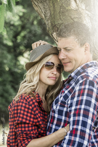 young laughing woman with his happy boyfriend photo