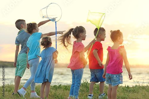 Happy kids playing on beach