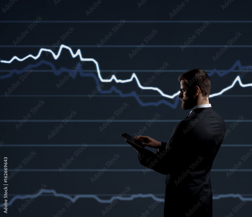 Businessman with smartphone standing over diagram background. Business, finance, investment concept. Businessman with smartphone standing over diagram background. Business, finance, investment concept.