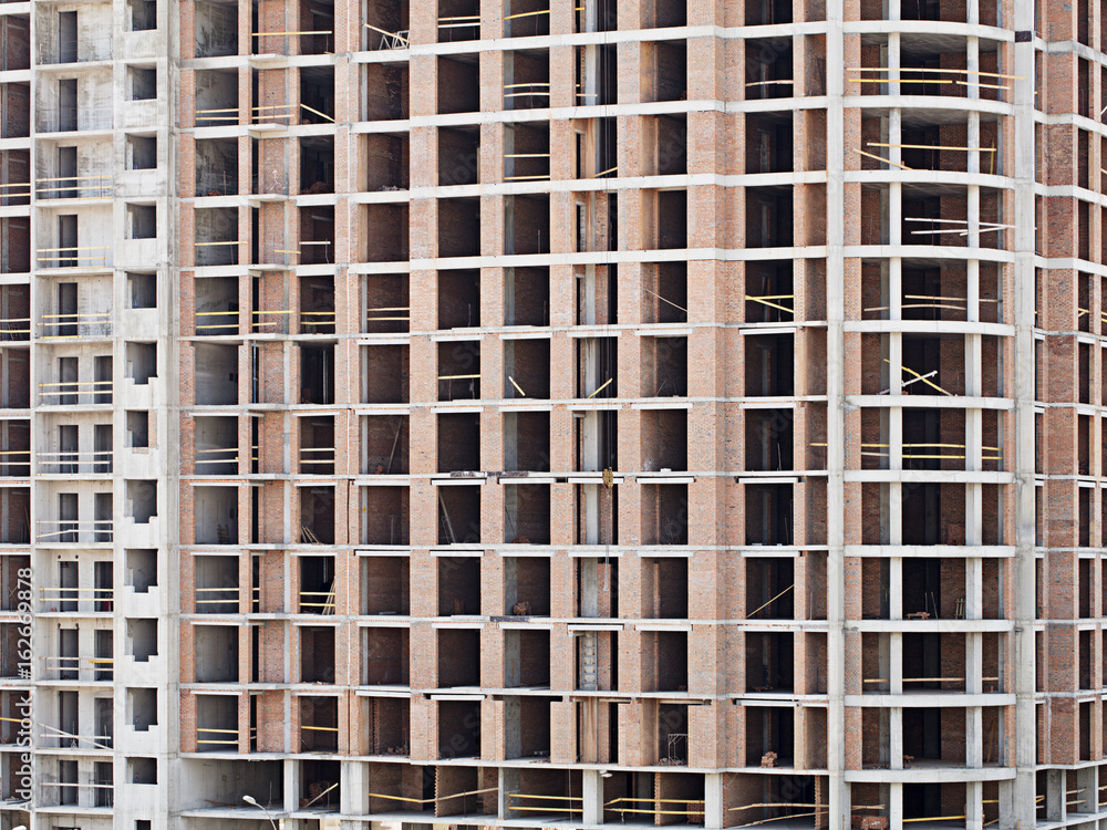 Monolithic frame construction on facade - building under construction. Monolithic frame construction on facade - building under construction.