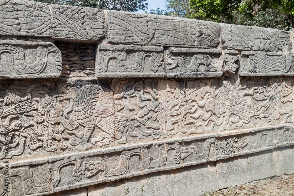 Carvings at the Platform of the Eagles and Jaguars at the archeological site Chichen Itza, Mexico