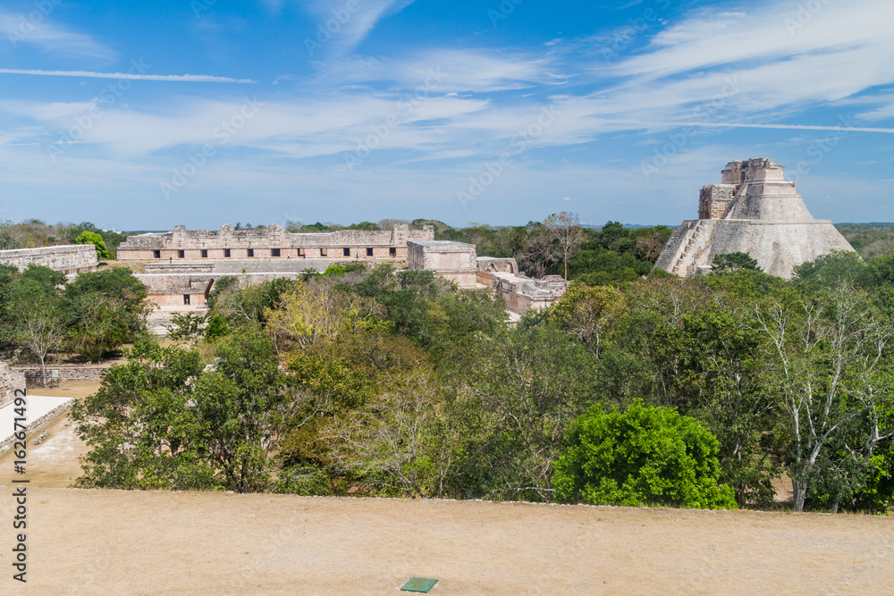 Nun's Quadrangle (Cuadrangulo de las Monjas) building complex and the Pyramid of the Magician (Piramide del adivino)  at the ruins of the ancient Mayan city Uxmal, Mexico