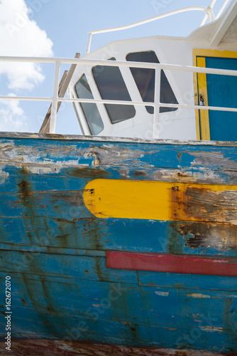 Jacked up colourful fishing boat  © Lux