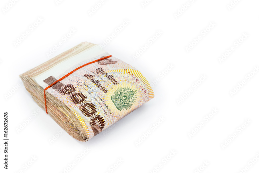Thai money currency, Stack of one thousand baht banknotes isolated on white background. Thai money currency, Stack of one thousand baht banknotes isolated on white background.