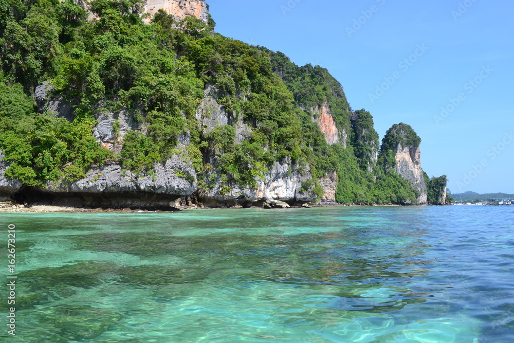 Paradise water with big limestone rocks at Koh Phi Phi