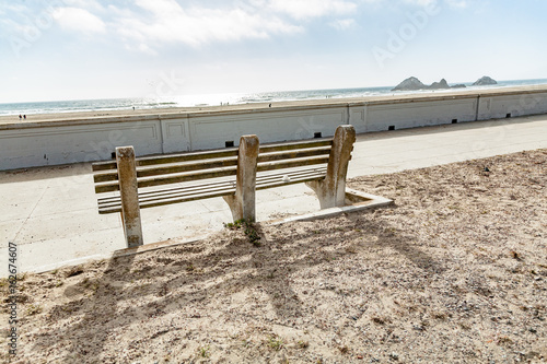 stone bench overlooking beach