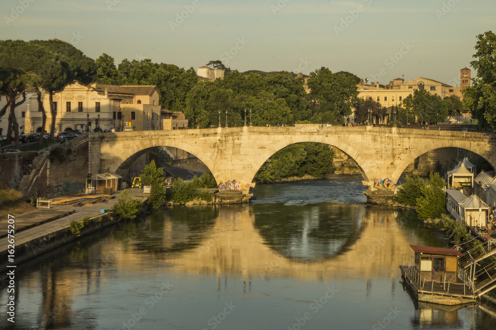 Popular destination bridge.  Roman genius architecture over the river in travel tourism destination.