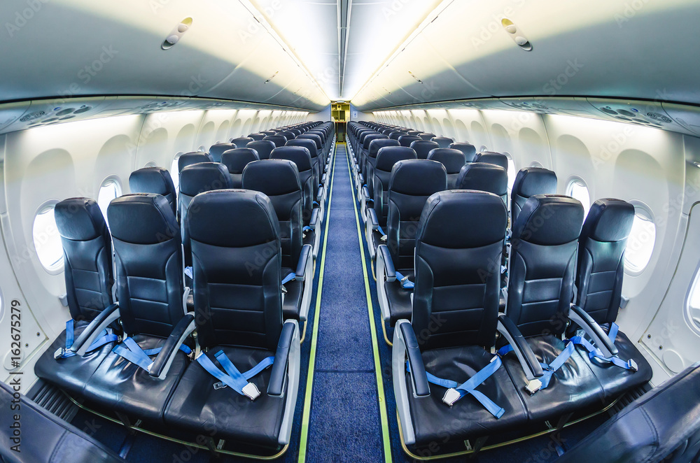 Fototapeta premium Inside airplane light view in passenger seats.