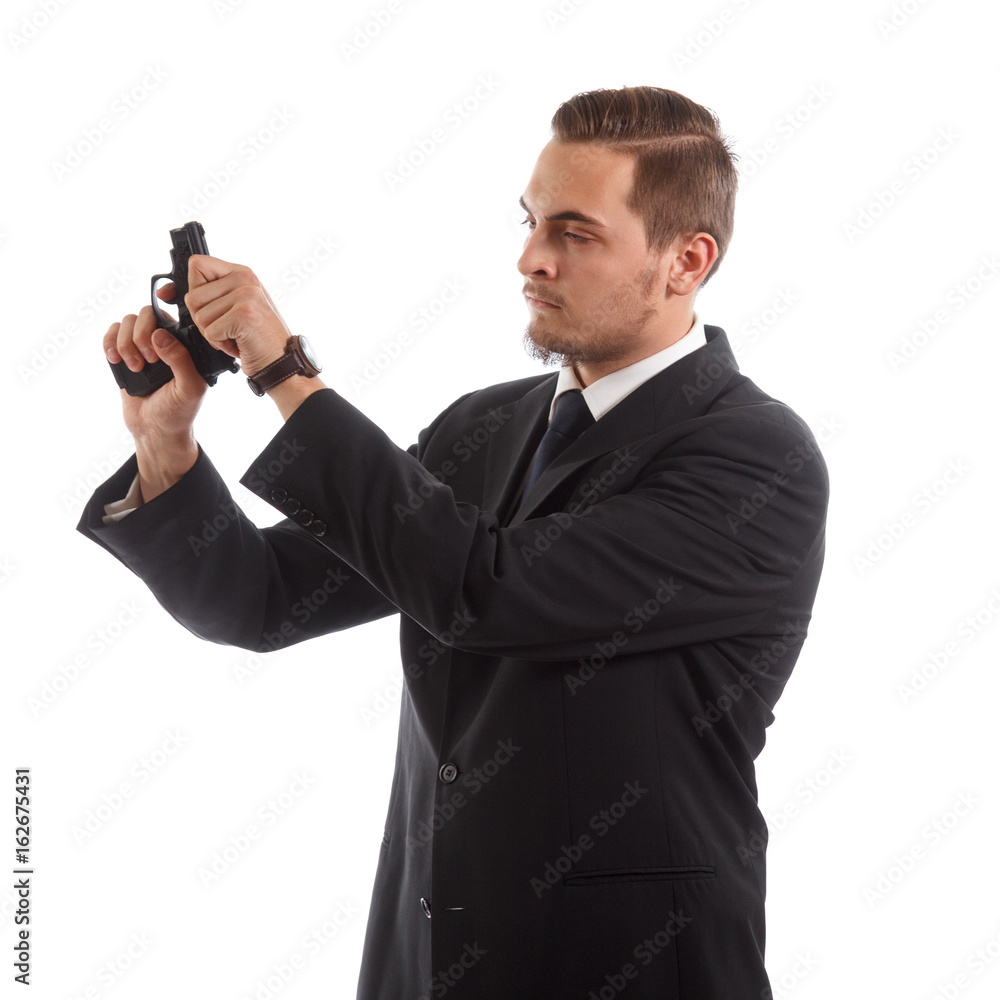 Man preparing a gun Man preparing a gun