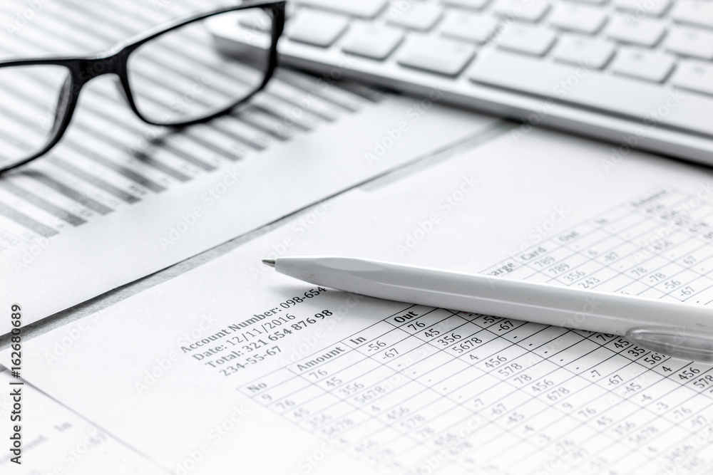 taxes accounting in office work space on stone desk background top view taxes accounting in office work space on stone desk background top view