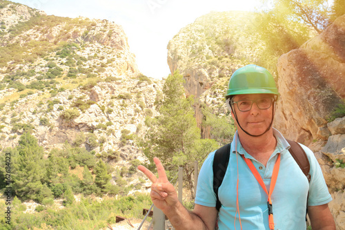 Mature man hiking on the way of the Caminito del Rey, Malaga, Spain