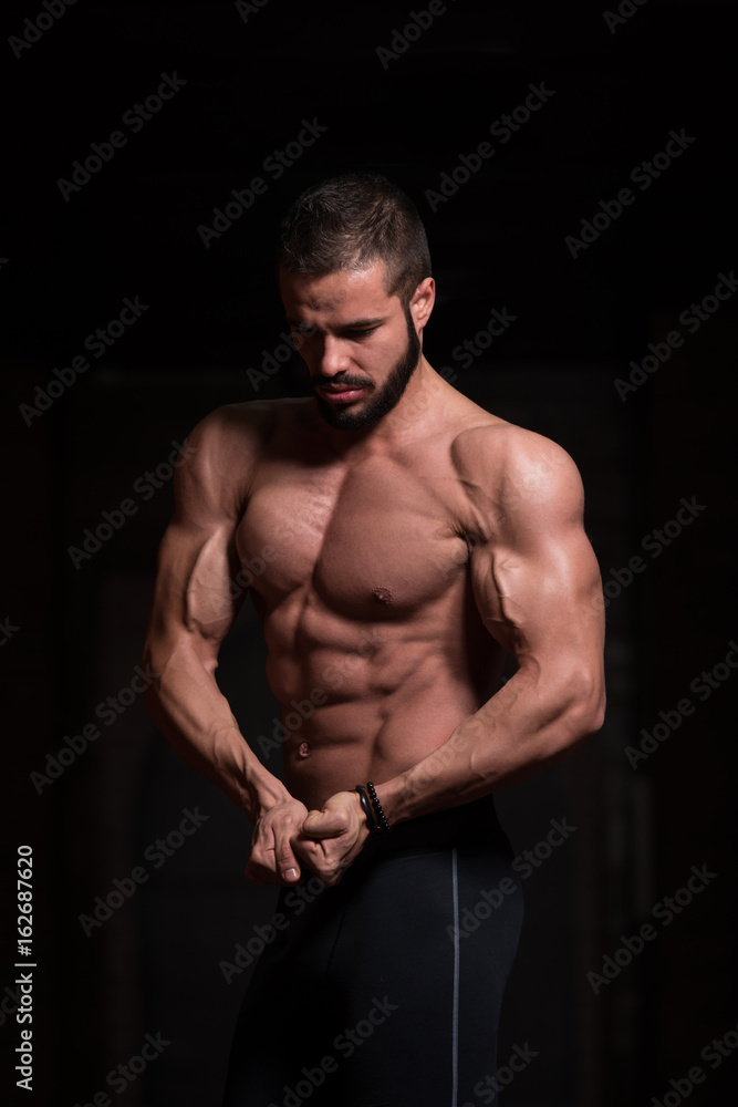 Model In Gym Showing His Well Trained Body
