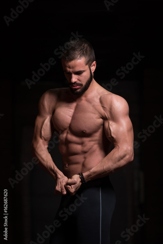 Model In Gym Showing His Well Trained Body