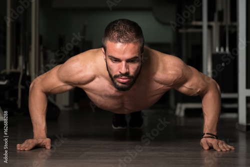 Model Exercising Push Ups