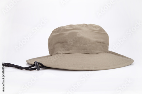 Khaki adventure hat on a white surface. Safari hat isolated on white background.